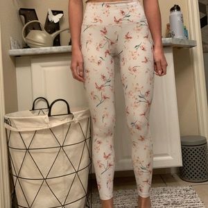 White with soft pink flower leggings.